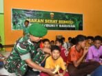Makan Bergizi Kodam I/BB Prajurit Kodam I/BB membagikan paket makan sehat bergizi kepada anak-anak panti asuhan di Deli Serdang.